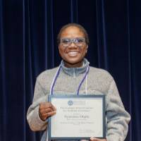 Fiyinfoluwa with the award